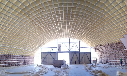 Enhance Your Innovaland Arch Steel Building with High-Performance Insulation